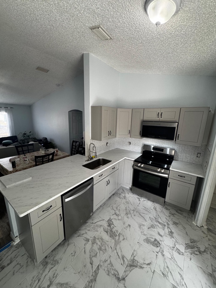 Kitchen after remodeling by GS One Tile